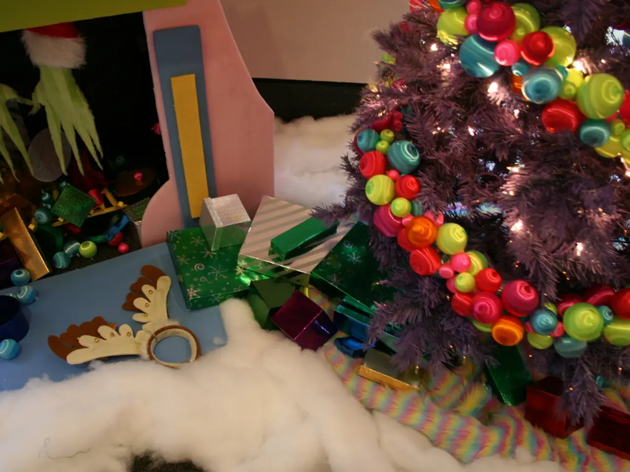 Craft a tree branch adorned with lichen and crab apples for organic home embellishments