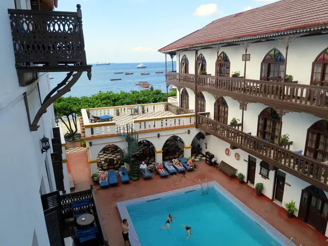 Thousands braved the rain to take a dip in the open sea, with over 35,000 participants reportedly...