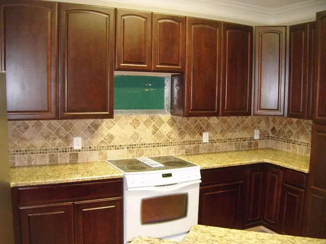 Expert Advice on Installing New Kitchen Flooring While Keeping Cabinets in Place for a Polished...
