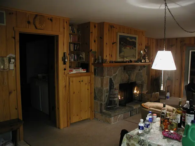 In this picture there are many wine bottles and glass bottles kept on the table. The background is...