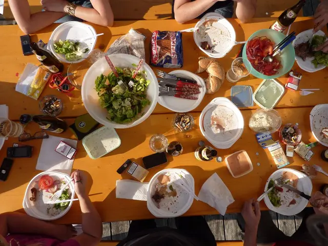 In this image we can see so many food items are kept in bowl and we can see bottles and fork....